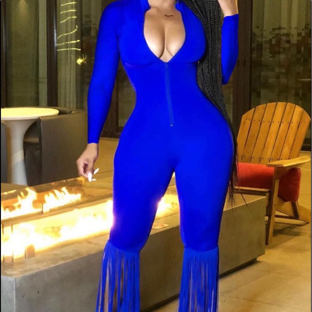 Blue long sleeve one piece jumpsuit with tassels
